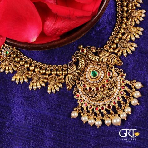 Alluring Gold Peacock Necklace From GRT Jewellers Grt Jewellers, South Jewellery, Antique Pearl Necklace, White Stone Necklace, Coral Jewelry Set, Gold Peacock, Antique Necklaces Design, Choker Necklace Designs, Peacock Necklace