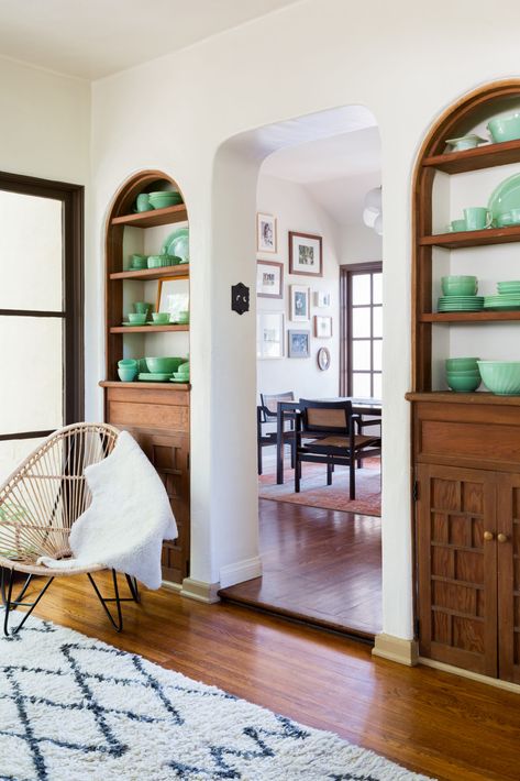 Arched Wall Built Ins, Doorway Built Ins, Arched Windows Interior, Historic Built Ins, Arched Built In Kitchen, Built Ins Around Arched Doorway, Arch Wall Built In, Built In Shelves Around Doorway, Cozy Built Ins