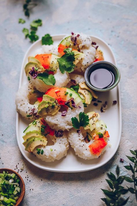 Rainbow Veggie Sushi Donuts Vegan Donuts Recipe, Sushi Donut, Rainbow Sushi, Making Sushi Rice, Tamari Almonds, Vegan Donut Recipe, Veggie Sushi, Coconut Chia Pudding, Avocado Cucumber