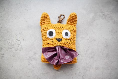 Crochet The Perfect Accessory For Any Dog Lover On Your List – An Amigurumi Poop Bag Holder! - KnitHacker Bag Holder Pattern, Amigurumi Gift, Crochet Pet, Diy Mom, Dog Waste Bag Holder, Crochet Hack, Mom Diy, Poop Bag Holder, Crochet Dog