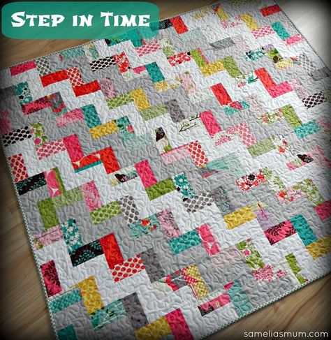 Step in Time Quilt Tutorial 48 x 54", 2 charm packs plus 1.25 yds. Of 2 solids, white and ash Kona solids here plus coordinated binding. Cut charm sq in 1/2, sew print to solid 2.5" strip, place squares in alternating directions, 2 print/white then 2 print, ash alternating to form a stair step pattern. Would make great toddler quilt. Precut Quilt Patterns, Rail Fence Quilt, Charm Pack Quilt, Charm Pack Quilts, Safe House, Fabric Backdrops, Jelly Roll Quilt Patterns, Charm Packs, Rail Fence