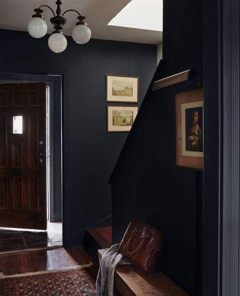 Blanc Marine Intérieurs on Instagram: “Another angle of our moody entry in Lachine. When dark colors bring warmth at first sight. 🖤⁠ ⁠ #betterdaysarecoming #designerlife ⁠…” Moody Entrance, Moody Entryway, Moody Christmas, Rustic Entry, Entrance Interior Design, Dark Hallway, Moody Decor, Navy Walls, Moody Interiors