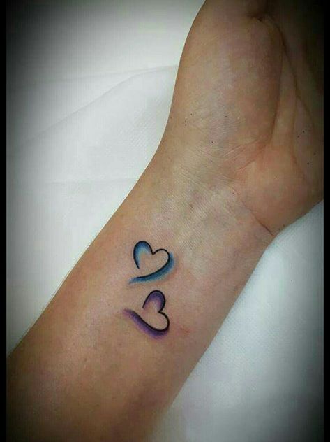 Small Blue Heart Tattoo, Heart Tattoo With Color, Heart Tattoo Ideas Female, Heart Tattoo For Kids, Multiple Heart Tattoos, Connected Hearts Tattoo, Colored Heart Tattoo, Heart Wrist Tattoos For Women, Tattoo Ideas Female Heart