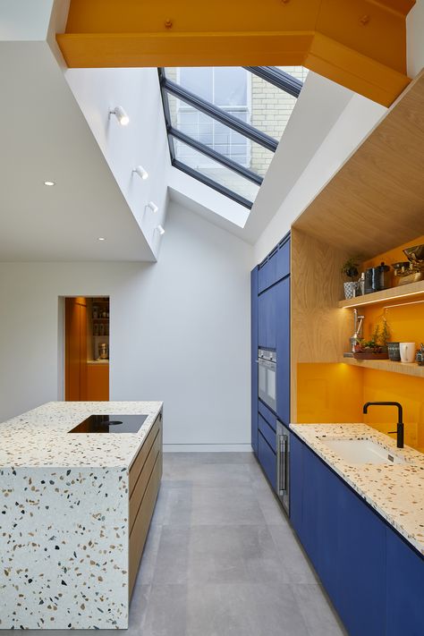 Contemporary kitchen with linoleum faced, midnight blue cabinetry and terrazzo worktop Terrazzo Kitchen Worktop, Blue Mid Century Kitchen, Contemporary Blue Kitchen, Terazzo Kitchen Counter, Terrazzo Island, Kitchen Top Design, Steel Blue Kitchen, Terrazzo Countertop Kitchen, Terrazzo Worktop