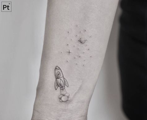 Tiny rocket tattoo by Pablo Torre - Tattoogrid.net Tiny Rocket Ship Tattoo, Rocket Ship Tattoo, Atom Tattoo, Rocket Tattoo, Couple Matching Tattoo, Belly Tattoos, M Tattoos, Tattoo Lettering Styles, 13 Tattoos