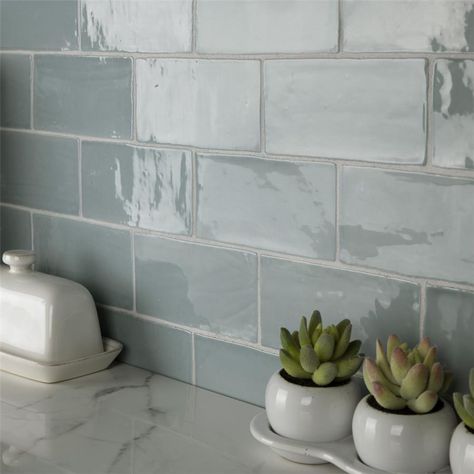 SomerTile - Chester 3" x 6" Subway Tile - Acqua The Chester Collection by SomerTile is a ceramic glazed wall tile that is available in 9 unique colors that is sure to fix any space. The Chester collection is also available in a 3"x12" subway tile, chair rail, bullnose, and a jolly edge trim. Specifications: Item Code: WNU36CAC Size: 3" x 6" Tile Depth: .4" Composition: Ceramic Residential use: walls Commercial use: walls Square Feet Per Box: 5.72 Pieces Per Box: 44 Seafoam Blue Kitchen, Coastal Kitchen Floating Shelves, Kitchen Blue Backsplash Ideas, Teal Kitchen Accents, Seafoam Backsplash, Blue Subway Tile Kitchen, Modern Coastal Kitchen Backsplash, Sage Subway Tile Kitchen, Kitchen Backsplash Ideas Blue