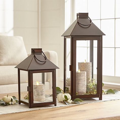 Knox Bronze Metal Lanterns | Crate and Barrel Decorating With Lanterns Indoors, Floor Lanterns Decor, Lantern Decor Living, Floor Lanterns, Outdoor Candle Lanterns, Floor Lantern, Traditional Lanterns, Modern Candle Holders, Living Room Decor Fireplace