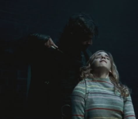 Hermione Granger being held captive by Antonin Dolohov in the Department of Mysteries. Antonin Dolohov, Department Of Mysteries, Harry Potter Screencaps, Harry Potter Anime, Black Characters, Harry Potter Characters, The Order, Hermione Granger, Hermione