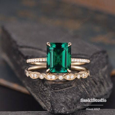 10x8mm Lab Emerald Engagement Ring Solitaire Yellow Gold Ring Bridal Set Wedding Women Anniversary Gift For Her Birthstone May Simple ITEM INFORMATION: Metal Type- Solid 14K Rose Gold WIDTH- ( approx. 1.5mm) **Engagement Ring** Center Stone- 8*10mm Emerald Cut Lab Emerald Side Stone- Natural Diamond Weight- 0.15ct Color- H Clarity- SI **Wedding Band** Band Width: 2.3mm  Stone- Natural Diamond Weight- 0.13ct Color- H Clarity- SI **Stone Replacement** Available with any other gemstones, please feel free to contact me for a quote. **Metal Type** Available in 14K or 18K yellow gold, white gold, and rose gold. Please select from the drop down menu. **Production Time& Rush Order** Our standard production time is 2-3 weeks from time of purchase. I am very happy to provide rush order service, the Lab Created Emerald Ring, Luxury Green Princess Cut Wedding And Engagement Ring, Luxury Octagon Emerald Ring As A Gift, Luxury Yellow Gold Emerald Ring, Emerald Stone Engagement Ring Gold, Emerald Gold Band Engagement Ring, Luxury Pear-shaped Emerald Promise Ring, Engagement Emerald Rings, Emerald Color Engagement Ring