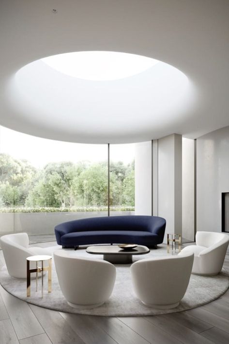 I really like how the rug mirrors the circular light. The dark couch definitely holds more mass than the rest of the room. Curved Ceiling, Curvy Sofa, Curved Furniture, Curved Walls, Loft Design, Furniture Trends, Curved Sofa, A Living Room, Ceiling Design