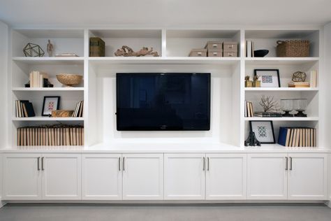 A wall of built-ins for a family room media center. – Addition on Three Floors – Board & Vellum Living Room Tv Wall Decor, Tv Wall Decor Ideas, White Entertainment Center, Built In Shelves Living Room, Living Room Wall Units, Living Room Built Ins, Tv Wall Decor, Living Room Entertainment, Living Room Tv Wall