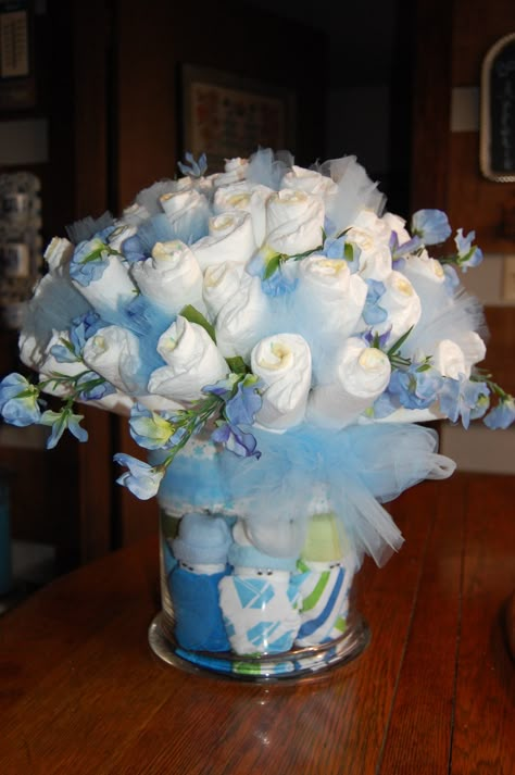 Diaper bouquet made using a couple of pinterest ideas. Diaper Bouquet, Diaper Gifts, Idee Babyshower, Diaper Cake Ideas, Baby Shower Crafts, Baby Shower Diaper Cake, Nappy Cakes, Baby Diaper Cake, Diy Baby Shower Gifts