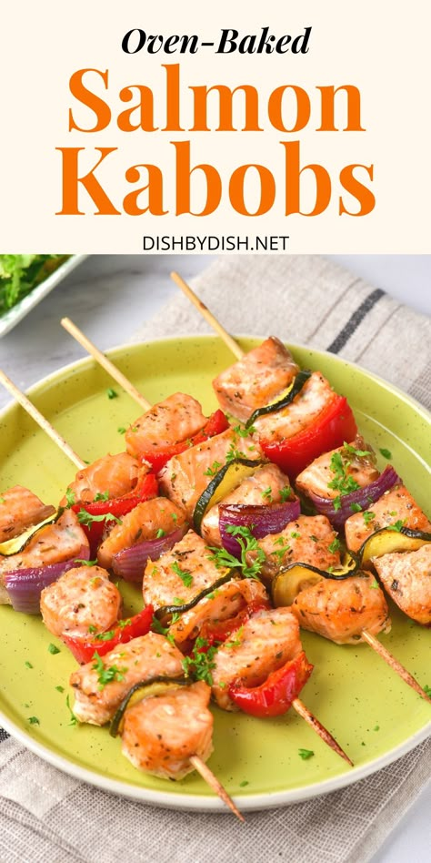 Salmon skewers on a green plate. Salmon Skewers Oven, Salmon Kabobs Oven, Kabobs In The Oven, Salmon Kabobs, Mediterranean Lunch, Seafood Sandwiches, Salmon Skewers, Fish Meals, Vegetable Kabobs