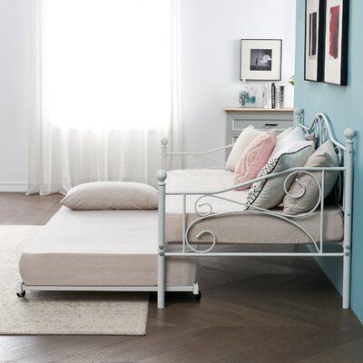 The daybed is a functional furniture set that can function as both a couch and a bed. When the house is small and there is no extra space available as the bedroom for guests to stay in, the daybed can be the handiest option to accommodate an overnight guest right in the living room. The daybed has premium quality and Victorian style, it can update a simple antique feel to your living room or bedroom. Color: White | 17 Stories Korecky Twin Daybed w / Trundle Metal in White, Size 39.0 H x 42.0 W x Twin Daybed With Trundle, Twin Daybed, Daybed With Trundle, Space Available, Bedroom Color, Overnight Guests, Functional Furniture, Furniture Set, Victorian Style