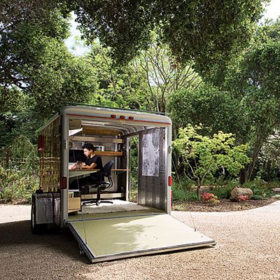 When Stavropoulos heads to a job, he tows this 2003 cherry-red trailer behind his Honda CR-V.  The (solar-powered) mobile studio’s loading ramp swings open to views of the real garden as Stavropoulos gets to work. Cargo Trailer Camper Conversion, Modern Dans, Cargo Trailer Conversion, Mobile Workshop, Cargo Trailer Camper, Office Pods, Mobile Office, Vintage Airstream, Backyard Office