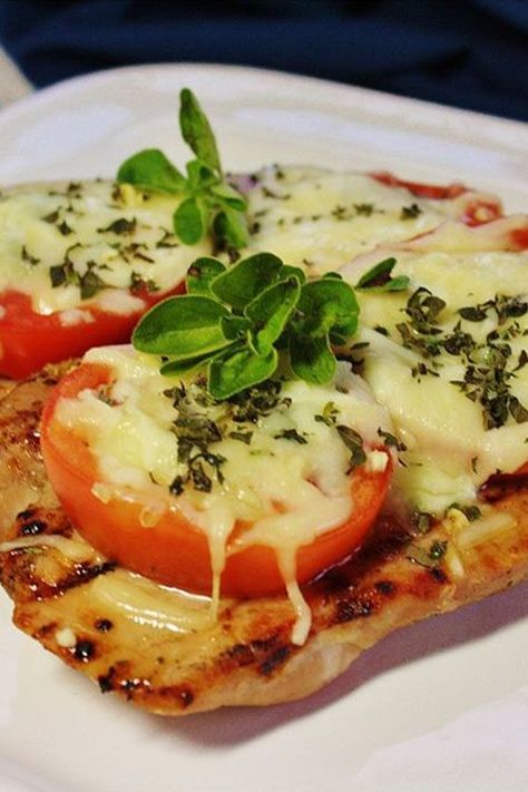 Looking for dinner ideas? Try cooking these pizza pork chops. Use pork chops, tomato, basil, and mozzarella cheese to cook these grilled pork chops for an easy dinner. Pizza Pork Chops, Tomato Basil And Mozzarella, Tomato Mozzarella Basil, Grilled Pork Chops, Tomato Mozzarella, Protein Diet, Dinner This Week, Baked Pork Chops, Pork Chop