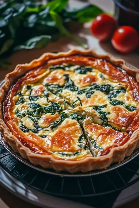 Looking for a dish that’s both simple and elegant? This Ricotta and Spinach Quiche is perfect for brunch or any occasion! 🥧✨

Here’s what you’ll need:

1 pre-made pie crust  
1 cup ricotta cheese  
2 cups fresh spinach, chopped  
3 large eggs  
1/2 cup heavy cream  
1/2 cup grated Parmesan cheese  
Salt and pepper to taste  

Directions:

1. Preheat your oven to 375°F (190°C).

2. In a mixing bowl, combine the ricotta cheese, chopped spinach, eggs, heavy cream, grated Parmesan cheese, salt, and pepper. Whisk until the mixture is smooth and well combined.

3. Place the pre-made pie crust into a pie dish and pour the ricotta and spinach mixture into the crust, spreading it
Enjoy this delicious quiche for brunch or any gathering! 🥗💖

#Quiche #BrunchIdeas #Ricotta #Spinach #HomeCooking Spanish Quiche, Spinach Eggs, Ricotta Spinach, Delicious Quiche, Countryside Life, Viral Food, Spinach Pie, Spinach Quiche, Spinach Ricotta