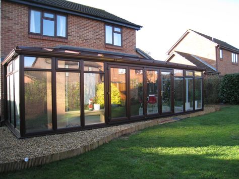 Rosewood PVCu DIY Lean-to Conservatory. Sunlounge Conservatories Manufactured and supplied by ConservatoryLand DIY Conservatories.  Conservatory photos kindly supplied by our customers. Small Conservatory, Lean To Conservatory, Conservatory Interior, Conservatory Kitchen, Conservatory Design, Garden Room Extensions, Sunroom Addition, Lean To, Room Extensions