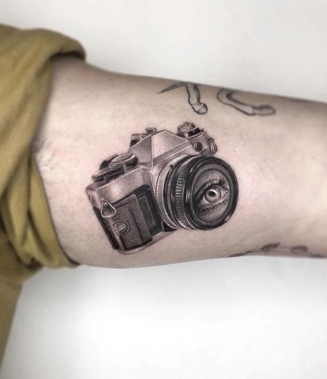 Maya Gat | tattoo artist page Camera Tattoo Design, Dna Tattoo, Camera Tattoos, Planet Tattoos, Camera Tattoo, Tattoo Photography, Head Tattoos, Tattoo Designs Men, Tattoo Ideas Design