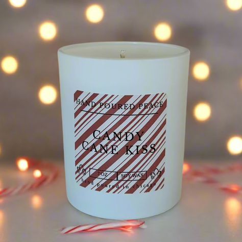 our holiday candles are OUT NOW✨🎄❄️ OH CHRISTMAS TREE CANDLE SMELLS LIKE pine! The ideal companion to enhance your festive spirit, creating moments filled with warmth, happiness, and the delightful spirit of the season! The base notes, featuring cedar and musk, add a rich depth, ensuring the fragrance lingers long.🎄✨ CANDY CANE KISS CANDLE SMELLS LIKE a rich, creamy blend of twisted peppermint and LIGHT zesty orange. The enchanting experience continues with base notes of frosty musk and ric... Twisted Peppermint, Candle Smells, Tree Candle, Christmas Tree Candles, Oh Christmas Tree, Holiday Candles, Candle Smell, Hand Poured, Candy Cane