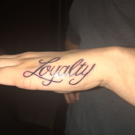 Hand Cursive Tattoo, Loyalty Hand Tattoos For Women, Script Hand Tattoos For Women, Cursive Hand Tattoos For Women, Wrist Tattoo Name, Loyalty Hand Tattoo, Trap Tattoo, Damon Torrance, Loyalty Tattoo