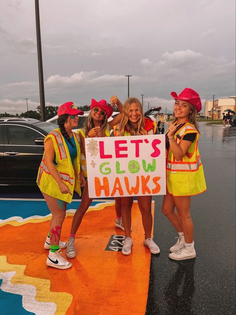 Football Game Construction Theme, Jersey Theme Football Game Poster, Paint Up Football Game Theme, Neon Themed Football Posters, Glow In The Dark Pep Rally Outfits, Neon Pep Rally Ideas, Hawiann Theme Football Games, Jail Break Football Theme, Neon Cheer Theme