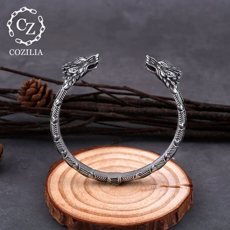 Embrace the wild spirit of the wolf with our Viking Wolf Head Torc Bracelet. A symbol of strength, loyalty, and untamed power. 🐺⚔️ #VikingSpirit #WolfPower #TorcBracelet Water Wolf, Vikings Jewelry, Hip Hop Accessories, Retro Boutique, Viking Men, Nordic Vikings, Bracelet Viking, Wolf Head, Style Punk