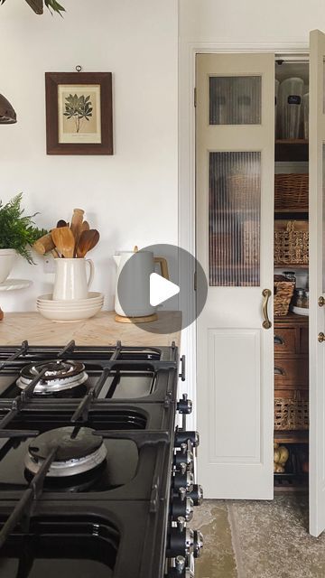 Anna King on Instagram: "I made these pantry doors a few years ago from some pine bi-fold doors I picked up in the sale! I wanted them to resemble bakery style doors so I stained & distressed them & added vintage rolling pins for handles! They have been much loved over the years & have been the most talked about feature in our home! It seems a lot of you love the rustic & unique look! But as time goes by my tastes have change & I wanted a cleaner & more modern look so I decided to give them a little makeover! I started by removing the top 2 panels to create windows, sanded & filled before painting with @farrowandball in the colour Dropcloth! For the frosted windows, I measured the open spaces & got some Perspex cut to size @cutmy.uk This was soooo much easier than cutting them myself! Pantry Accordian Door Ideas, Fold In Doors, Pantry Door Inspiration, Small Pantry French Doors, Pantry French Door Ideas, Small Double Door Pantry, Pantry Bifold Door Makeover, Kitchen Pantry Bifold Doors, Pantry Door Remodel