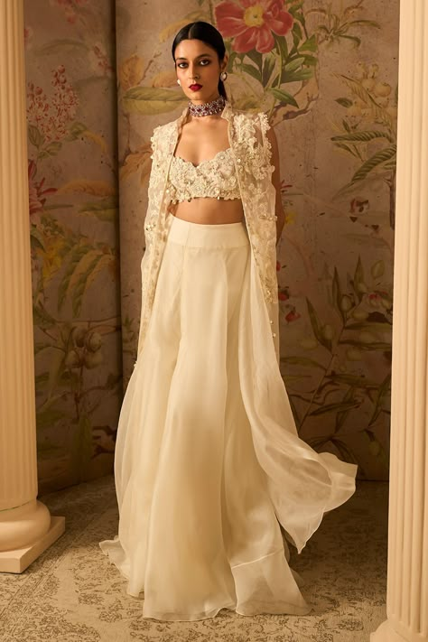 Buy Ridhi Mehra Ivory Organza Edgy Embroidered Jacket Sharara Set Online | Aza Fashions Luxury Off White Sharara With Cutdana Details, Luxury White Sharara With Lace Work, Luxury Off White Sharara With Resham Embroidery, Luxury Bollywood Sharara In Organza, Luxury Organza Sharara For Festivals, Luxury Organza Sharara With Floral Embroidery, Luxury Organza Sharara For Summer, Luxury White Kundan Dress, Luxury Designer Organza Choli