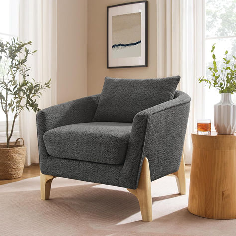 his modern accent chair, with its boucle fabric and solid wood legs, exudes an elegant and cozy charm, adding a natural touch to your home decor. With its wrap-around backrest and high-quality sponge filling, this chair lets you comfortably lean back while enjoying a good book, providing a cozy spot to rest your hands. Armchair Cozy, Boucle Chairs, Cozy Chairs, Armchair Bedroom, Chairs For Living Room, Leather Sofa Chair, Faux Leather Sofa, Living Room Chair, Sofa Accessories