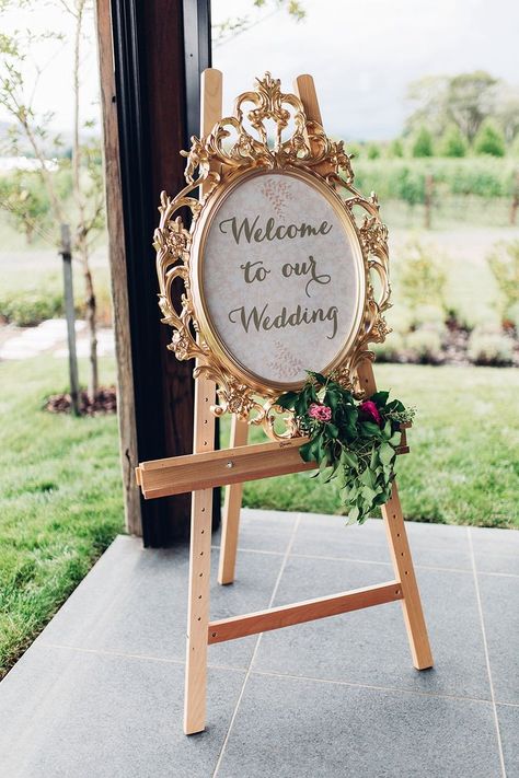 Gold Guilt Oval Ornate Frame Wedding Sign | Elegant Metallic Gold & Red Wedding Inspiration | Rockstars and Royalty Dresses | Peony N' Pearl Florist | Swish Vintage Canberra | Miss Gen Photography | http://www.rockmywedding.co.uk/elegant-metallic-gold-red-wedding-inspiration/ www.donnacrain.com for all bridal accessories X Gold Red Wedding, Snow White Wedding, Wedding Reception Entrance, Vintage Wedding Signs, Welcome To Our Wedding, Disney Wedding, Wedding Frames, Wedding Deco, Red Wedding