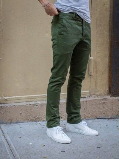 Olive green is a staple color for the fall season. Pair earth tones with a pair of olive chinos for a great look. Get some inspiration for this collection. Pants Hacks, Pantsir S1, Dragon Pants, Fire Pants, Green Pants Men, Olive Chinos, Green Pants Outfit, Design Pants, Man Pants