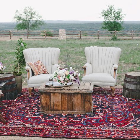 Brides.com: . A vintage llounge area with armchairs and wooden barrel side tables. Wedding Lounge Ideas, Boho Event, Lounge Zone, Wedding Lounge Area, Lounge Seating Area, Boho Lounge, Vintage Couch, Wedding Lounge, Wedding Furniture