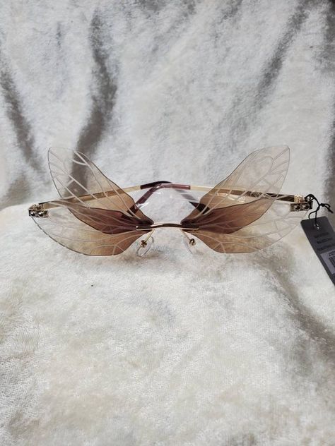 Check out this item in my Etsy shop https://www.etsy.com/listing/1066207636/dragonfly-fairy-wing-sunglasses Fairy Sunglasses, Fairy Wings Dragonfly, Dragonfly Glasses, Dragonfly Wings Aesthetic, Dragon Fly Wing Sunglasses, Wing Sunglasses, Dragonfly Fairy, Hazel Contacts, Fairy Wing Earrings