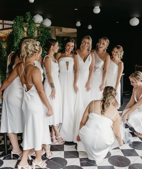 women in midi length slip gowns showing how you can wear white to a wedding Midi White Bridesmaid Dresses, Bridal Party In White, White Bridal Party, Crystal Wedding Dress, Hijab Wedding Dress, All White Wedding, Pakistani Wedding Dress, Weddings By Color, White Accessories