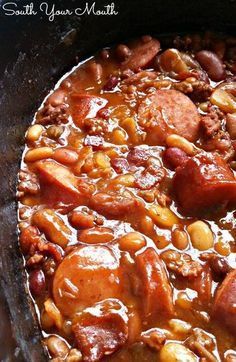 Three Meat Crock Pot Cowboy Beans | BBQ beans with smoked sausage, bacon and ground beef! Slow Cooker Chicken Mushroom, South Your Mouth, Bean And Bacon Soup, Beans In Crockpot, Slow Cooker Beans, Sausage Crockpot, Bbq Beans, Cowboy Beans, Beans And Sausage