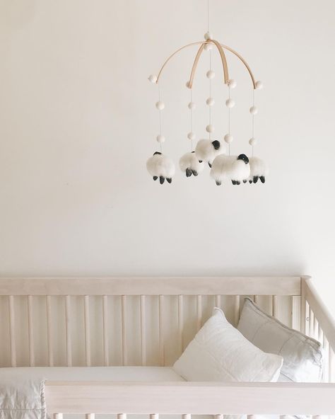 Mandi Nelson on Instagram: “A little peek in the nursery of my cute new mobile from @hellobirdiebirdie. Everything is starting to feel so much more real to me. Now…” Sheep Mobile, Sheep Nursery, Lamb Nursery, Dreamy Nursery, Baby Mobiles, Scandinavian Nursery, Newborn Clothes, Nursery Modern, Rustic Nursery