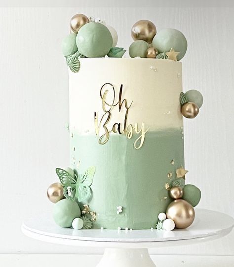 Sage Green Gender Reveal Cake, Sage Green Christening Decor, Baby Shower Cake Green And Gold, Olive Green Baby Shower Cake, Green Gender Reveal Cake, Green White Gold Cake, Sage Green And Gold Cake, Green Baby Shower Cakes, Sage Green And Pink Cake