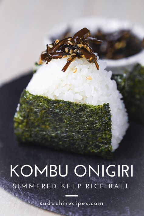 Japanese rice ball "kombu onigiri" wrapped in nori dried seaweed and served on a slate plate Rice Ball Filling, Inarizushi Recipe, Sticky White Rice, Seaweed Onigiri, Onigiri Rice, Onigiri Recipe, Rice Snacks, Rice On The Stove, Vegetarian Mains