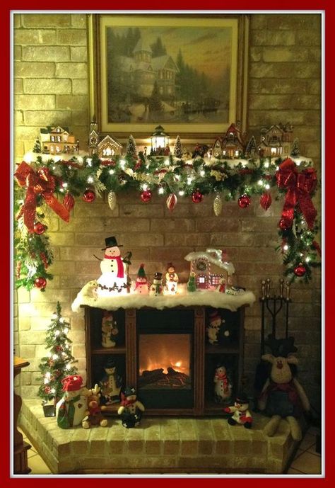 Christmas mantel, snow village, Christmas Village, garland: Holiday Mantel, Christmas Mantle Decor, Christmas Decorations For Kids, Christmas Village Display, Christmas Mantel, Christmas Mantel Decorations, Christmas Mantle, Christmas Fireplace, Christmas Villages