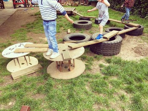 I love this idea for gross motor and open-ended building! Children are given an opportunity to develop gross motor skills when they are moving heavy objects around while using critical thinking skills to decide where objects should go.  I wonder where children will go when their designs fall? Will they work together in teams or work independently? School Outdoor Area, Eyfs Outdoor Area, Outdoor Play Space, Outdoor Learning Spaces, Outdoor Nursery, Outdoor Play Spaces, Play Garden, Outdoor Play Areas, Nursery Activities