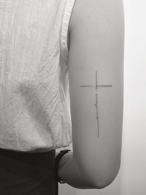 Crossword Tattoo Ideas, Cross Fine Line Tattoo, Cross Spine Tattoos For Women, Back Elbow Tattoo, It Is Finished Tattoo, All In Tattoo, Resilient Tattoo, Above Elbow Tattoo, Resilience Tattoo