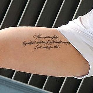 Brad Pitt has a poem from Jalal ad-Din Rumi tattooed on his arm that reads: "There exists a field, beyond all notions of right and wrong. I will meet you there." Brad Pitt Tattoo Arm, Rumi Tattoo, Brad Pitt News, Brad Pitt Tattoo, Private Tattoos, Stomach Tattoos, Cool Tattoos For Guys, Home Quotes And Sayings, Popsugar