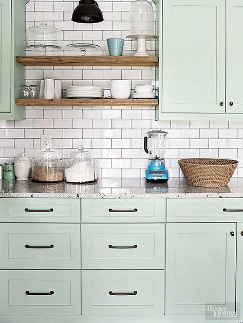 Light green cabinets.Paint Color: Benjamin Moore, Tea Light 471. #paintingkitchencabinets Mint Kitchen, White Subway Tile Backsplash, Painted Kitchen Cabinets Colors, Green Kitchen Cabinets, Farmhouse Kitchen Cabinets, Popular Kitchens, New Kitchen Cabinets, Green Cabinets, White Subway Tile