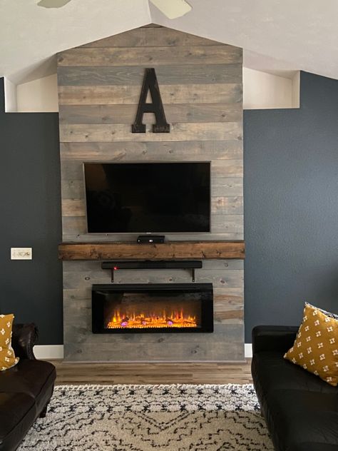 Floating Fireplace Under Tv, Fireplace With Tv Makeover, Corner Chimney Ideas, Fireplace Chase Ideas, Mantel With Fireplace Insert, Diy Fireplace Feature Wall, Pallet Wall Fireplace, Wall Mounted Fireplace Electric And Tv, Tv Over Fireplace Hidden Components