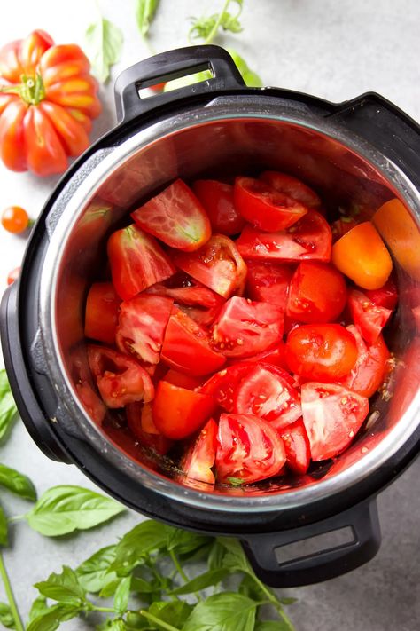 This Instant Pot Tomato Soup is super flavorful and made with fresh garden tomatoes! Besides the fresh tomatoes and lots of basil, the flavors come from a base of sautéed onions, garlic, spices and vegetable broth. #instantpottomatosoup #tomatosoup Garden Tomato Soup Instant Pot, Tomato Soup Pressure Cooker, Insta Pot Tomato Soup Recipes, Roma Tomatoes Soup, Tomato Soup Recipe Instant Pot, Fresh Tomato Soup Instant Pot, Instant Pot Tomato Recipes, Instapot Tomato Soup Recipes, Instapot Tomato Soup