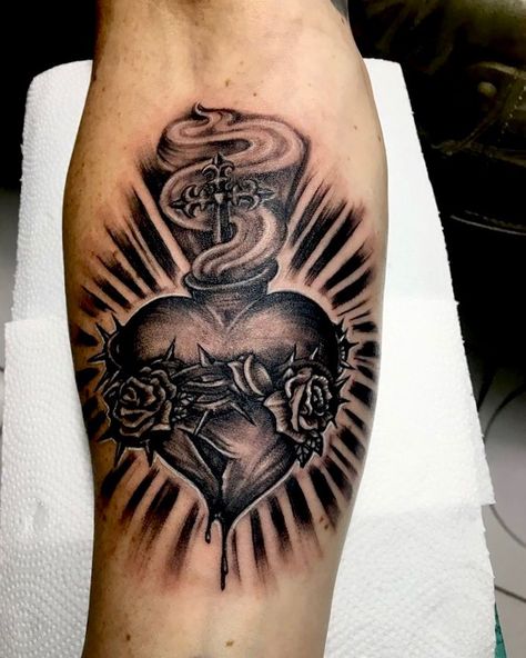 #Tattoos,sacred heart tattoo Men Heart Tattoo, Heart Tattoos For Men, Sacred Heart Hand Tattoo, Red Chest Tattoo, Sacred Heart Of Jesus Tattoo, Sacred Heart Tattoo Design, Sacred Heart Tattoo, Chest Tattoo With Meaning, Key Tattoo Designs