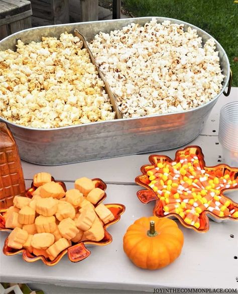 Are you hosting a Fall party soon? Get inspired with Harvest party and popcorn bar ideas! Find yummy popcorn flavors, easy decoration ideas and a fun campfire set up! |Fall Entertaining | Fall Party Ideas | Seasonal Party | Backyard Entertaining | Popcorn Station Ideas | Popcorn Flavors | Popcorn Recipe| Popcorn Bar Ideas, Popcorn Station, Picnic Event, Campfire Party, Fall Bonfire, Party Popcorn, Fall Backyard, Fall Harvest Party, Fall Party Themes