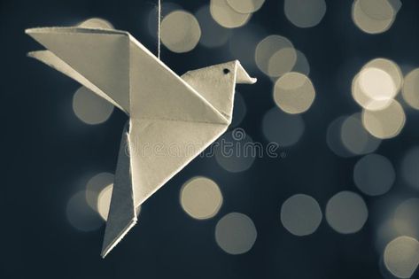 Photo about Japanese traditional origami bird flying in a bokeh light grayscale background. a symbol of freedom, an expression of unity in diversity. Image of learning, hope, light - 131284253 Origami Photography, Paper Elephant, Display Photography, Hope Light, Symbol Of Freedom, Bird Flying, Green Circle, Origami Bird, Eagle Brand