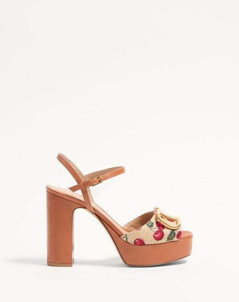 Valentino Garavani platform sandal in synthetic raffia jacquard with Cherryfic motif, leather detailing and VLogo Signature decoration - VLogo Signature accessory with antique brass effect brass - Block heel and leather-covered platform - Heel height: 115 mm / 4.5 in. with 35 mm / 1.4 in. platform - Made in Italy Leather Detailing, Platform Heel, Natural Red, High Heel Sandals, Platform Heels, Valentino Garavani, Platform Sandals, Women's Shoes Sandals, Antique Brass